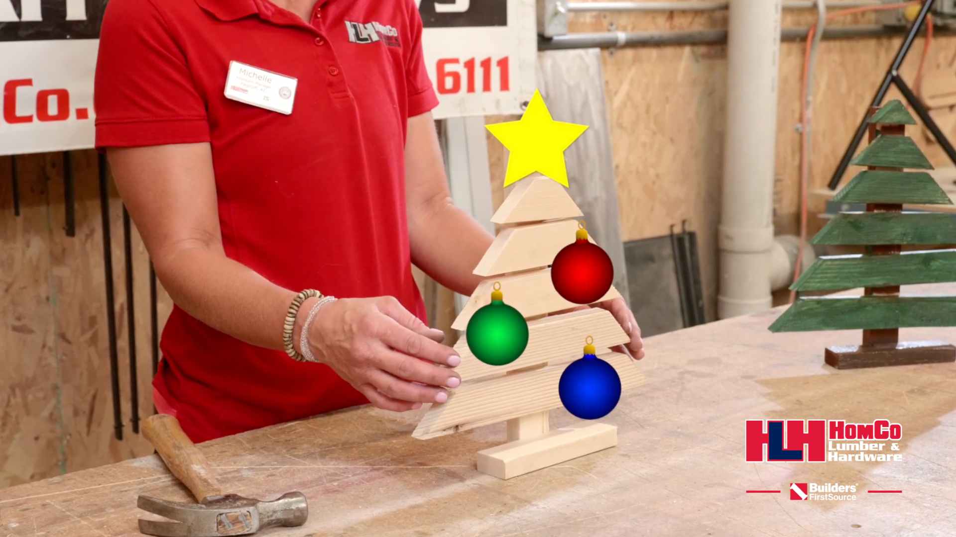 wooden christmas tree on workbench with ornament graphics to indicate decoration